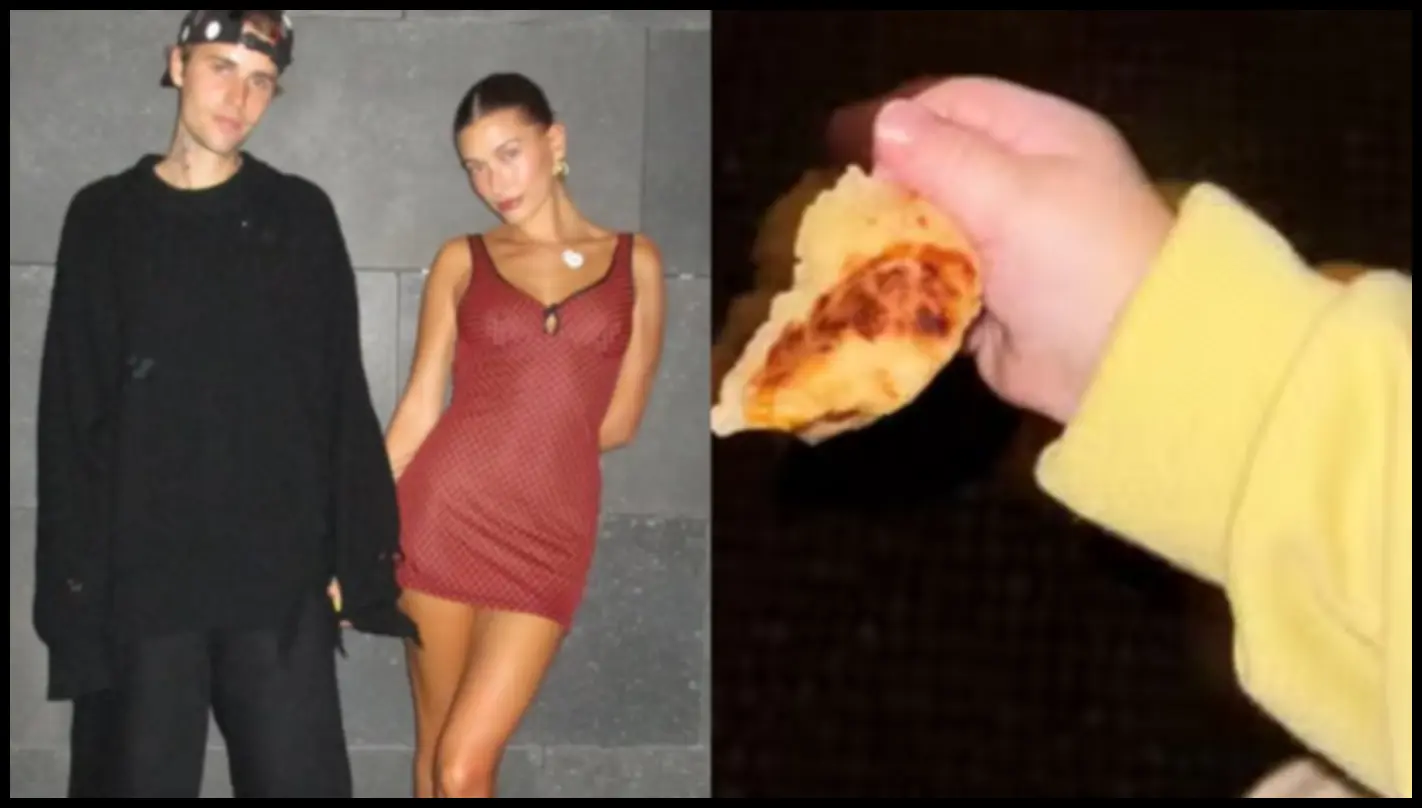 Bebê segurando pão de queijo